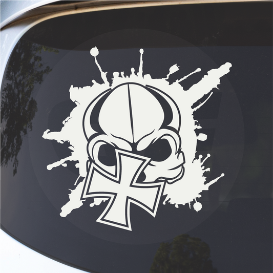 Detail close-up of the skull graphic sticker featuring a black and white design with a cross symbol.