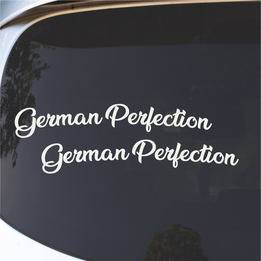 Detail close-up of the white vinyl decal with script font and repeated text on a smooth surface