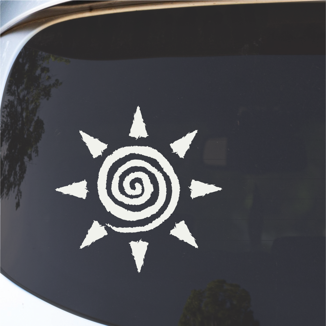 Detail close-up of the sun spiral decal in black and white with an eight-pointed star design.